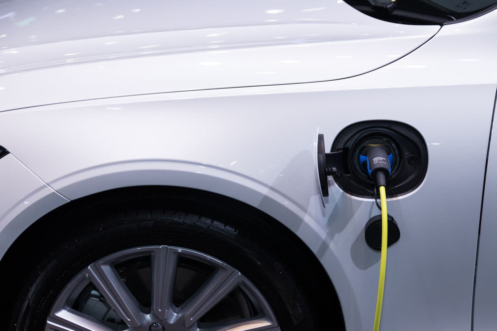 Charging cable plugged into an electric car's charging port