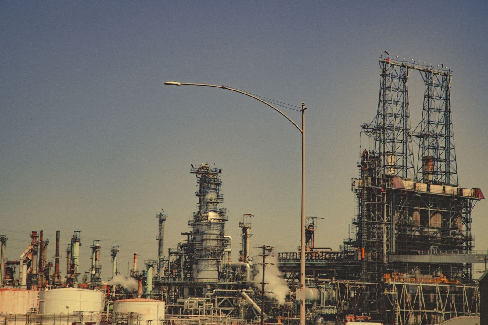 Industrial oil refinery at dusk