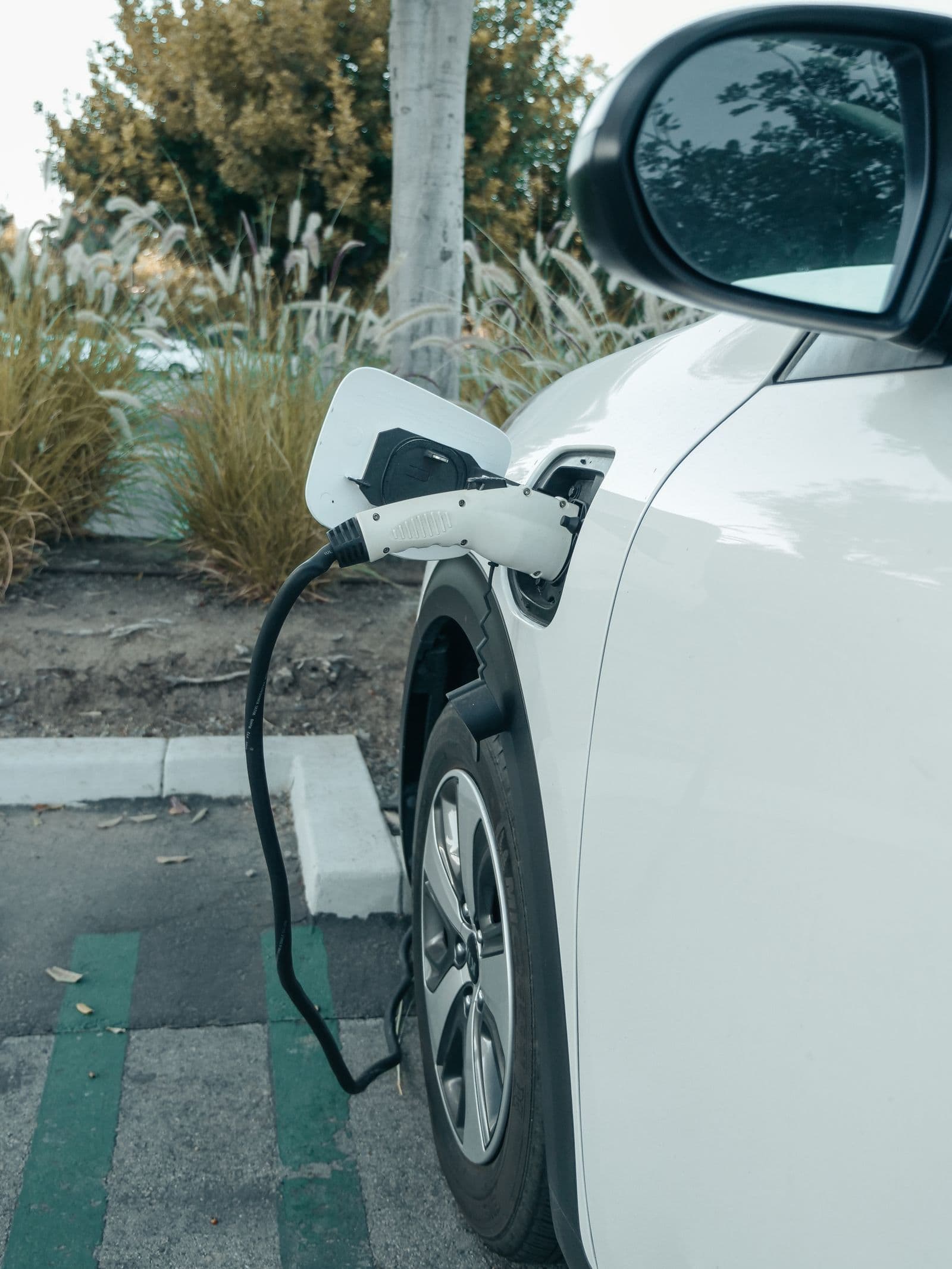 Electric car charging cable connected at a home charge point
